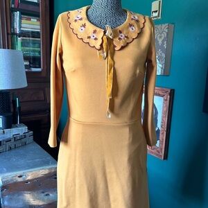 Elegant Mustard Yellow Dress with Floral Collar